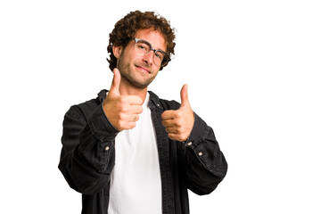 Wall Mural - Young curly smart caucasian man cut out isolated raising both thumbs up, smiling and confident.