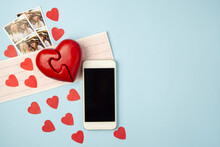 Mobilephone, Cardiogram ,photo Smiling Family And Red Heart  On Blue Background.Medical Heart Cardiology Concept. Valentines Day Concept.