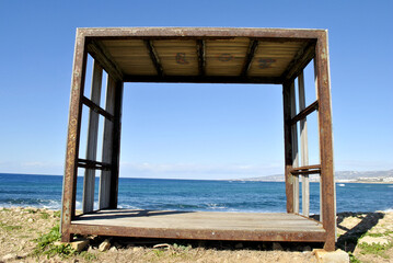  wooden box over the sea