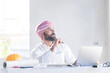 © ND STOCK - Architect concept, Architects working with blueprints in the office Business accessories (laptop, smartphone, pens, magnifier), accessories for drawing (plans, rulers) and learning on the table