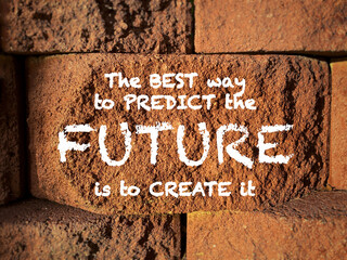 The best way to predict the future is to create it. Text on rock background. Inspirational motivational quote.

