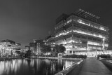 Fototapeta Nowy Jork - modern office building in Hong Kong city at night