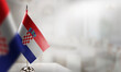 © v-a-butenkov - Small flags of the Croatia on an abstract blurry background