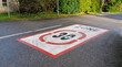 30km/h speed limit traffic road sign painted on the road