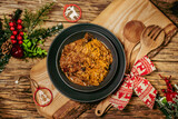 Fototapeta  - Homemade sauerkraut stew with mushrooms. Traditional Polish bigos.