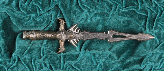 Sticker - ceremonial dagger on green velvet