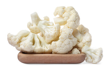 Wooden plate with cut fresh raw cauliflowers on white background