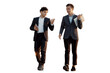 © muse studio - Young businessmen in formal suits, two in full height, isolated transparent background.
