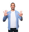 © agongallud - Happy young man doing a number eight gesture with his hands