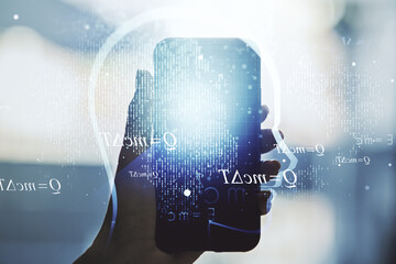 Poster - Creative artificial Intelligence concept with human head hologram and hand with phone on background. Multiexposure