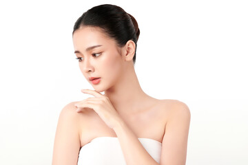 beautiful young asian woman with clean fresh skin on white background, face care, facial treatment, 
