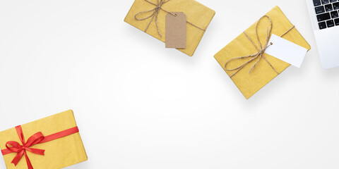 Poster - Composition of Gift box and laptop for frame and copy space