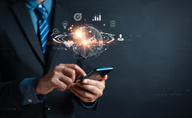 Leinwandbilder - Businessman using smartphone planning development leadership and customer target group with Business global internet connection technology and digital marketing, Financial and banking.