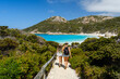 Ladies are enjoying beautiful turquoise water of little beach in Albany, Western Australia