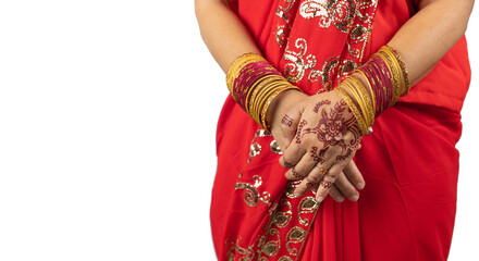 Hindu woman paint mehndi on hand in traditional Indian costume saree dress on white background..