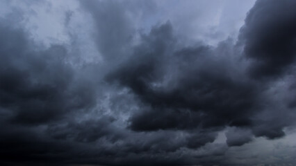 Aufkleber - The dark sky with heavy clouds converging and a violent storm before the rain.Bad or moody weather sky and environment. carbon dioxide emissions, greenhouse effect, global warming, climate change