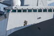 An armed soldier aboard an army warship. Security of army ships