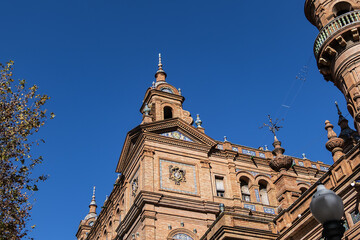 Wall Mural - The picturesque renaissance and Moorish building styles in the Spain square (Plaza de Espana). Seville, Andalusia, Spain.