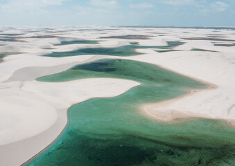 Wall Mural - aerial view of white sand dunes of Lencois Maranhenses with blue water pools