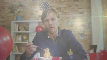 Poster - Animation of light spots over caucasian man eating spaghetti