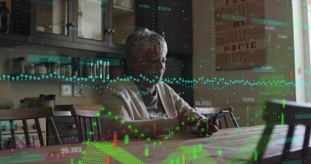 Sticker - Animation of financial data processing over senior biracial woman using smartphone