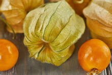 Peruvian Physalis, Cape Gooseberry Fresh Peachberry Very Tasty And Healthy Berries, On A Wooden Table