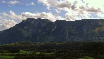 Wall Mural - Stunning alps showing in this aerial shot on beautiful summer day