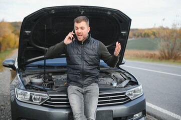 Wall Mural - a man feel stress because his car is broken down