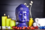 Fototapeta Desenie - meditation home decor buddha statue with candles and reed diffuser