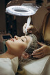 © Roman - Woman undergoing procedure of vacuum hydro peeling in beauty salon