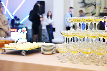 Catering work. Serving guests in the lobby of the concert hall before the start of the event