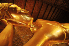 Reclining Buddha At The Wat Pho Located In Bangkok.