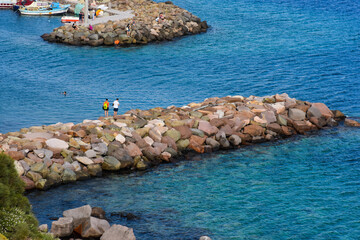 Wall Mural - Behramkale, Çanakkale, Turkey. Ancient harbour from Assos Temple located in the Ayvacık district of Çanakkale. It is also one of the earliest cities in Anatolia to accept Christianity. 