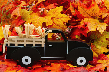 Canvas Print - Old retro truck with fall leaves