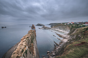 Wall Mural - Flysch geological coastline, Flysch formations in Santander in the Basque Country, Spain