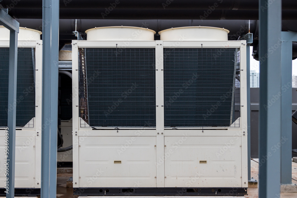 Air conditioner compressor installed on roof building. Industrial air ...