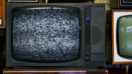 Wall Mural - Old TV with grey interference screen. Static noise of 80s retro tv screen