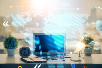Poster - Double exposure of desktop with computer and world map hologram. International data network concept.