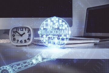 Poster - Multi exposure of blockchain theme hologram and table with computer background. Concept of bitcoin crypto currency.