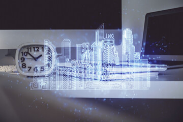 Poster - Desktop computer background in office and big town buildings hologram drawing. Double exposure. Smart city concept.