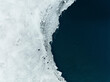 © AmazingAerialAgency - Aerial view of half frozen Ulfljotsvatn lake, in Grímsnes-og Grafningshreppur, Iceland.
