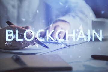 Poster - Cryptocurrency hologram over woman's hands writing background. Concept of blockchain. Double exposure