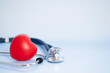 © Tetiana - medical stethoscope and heart on blue background and copy space for insurance planning, protection and safety family health concept. Medicine and valentine's day concept