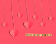 Valentine's Day background. Beautiful cute hearts on pastel pink table flat lay composition. Valentines Day greeting card concept.