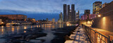 Fototapeta Nowy Jork - Panorama of frozen Moskva river and Moscow business center skyscrapers at nightfall