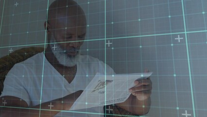 Poster - Animation of shapes moving over senior african american man reading