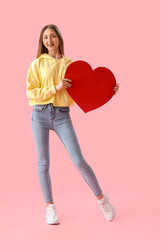 Sticker - Young woman with paper heart on pink background. Valentine's Day celebration