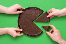 Pie Chart Concept, People Sharing Chocolate Cake, Above View On A Green Background.