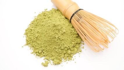 Wall Mural - Matcha green powder and whisk for cooking matcha tea isolated on white background