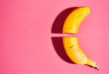 Banana On Pink Background